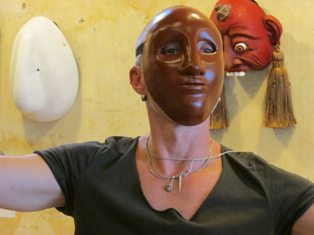 jonathan kipp becker demonstrates neutral mask at gallery show